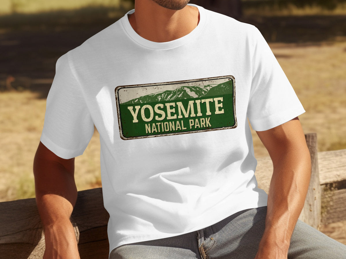 White t-shirt featuring a distressed green Yosemite National Park sign graphic.