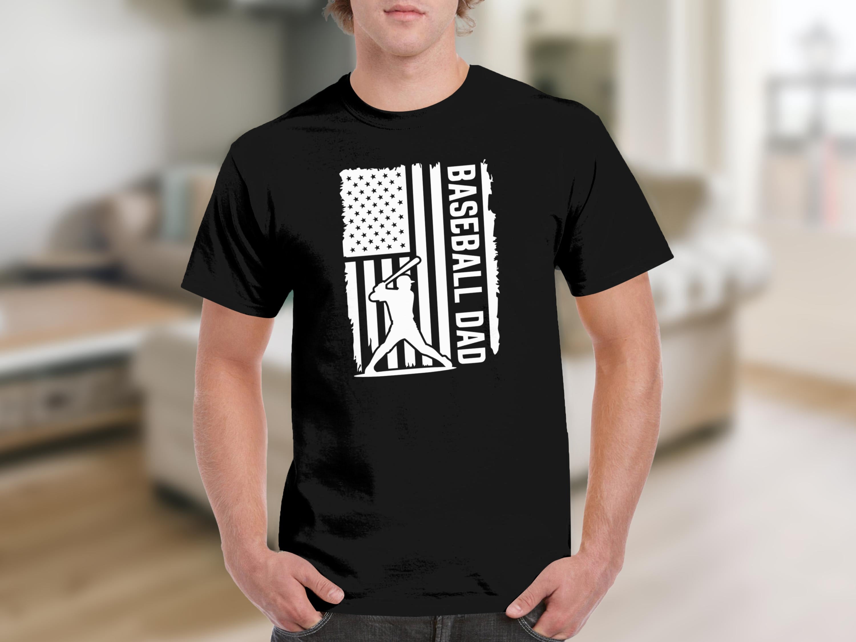 Black t-shirt with white baseball player silhouette and "BASEBALL DAD" text over distressed US flag.