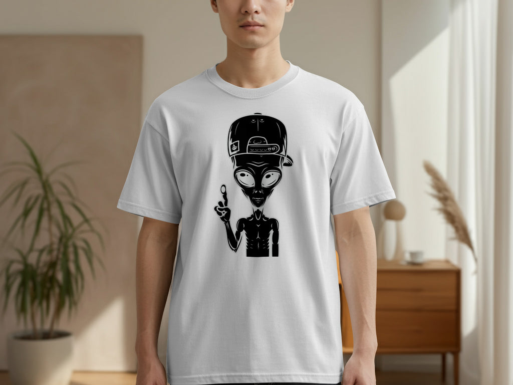 White t-shirt with a black graphic of an alien wearing a baseball cap and raising a finger.