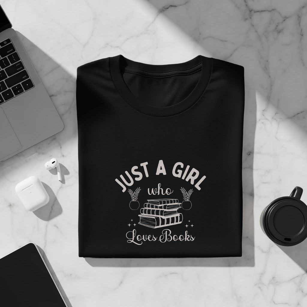Black t-shirt with "Just a girl who loves books" text and book illustration.