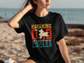 Black t-shirt with "Kayaking Dad Like a Regular Dad But Cooler" text and graphic.