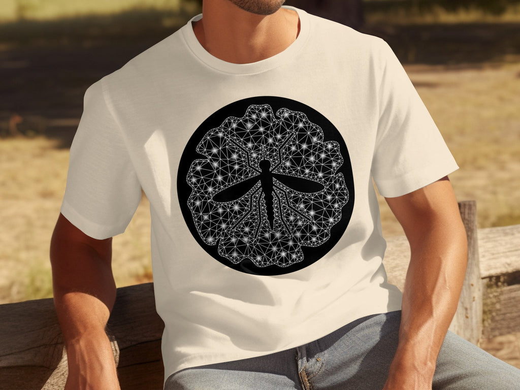 Cream t-shirt with a black circular design featuring a dragonfly and intricate geometric patterns.