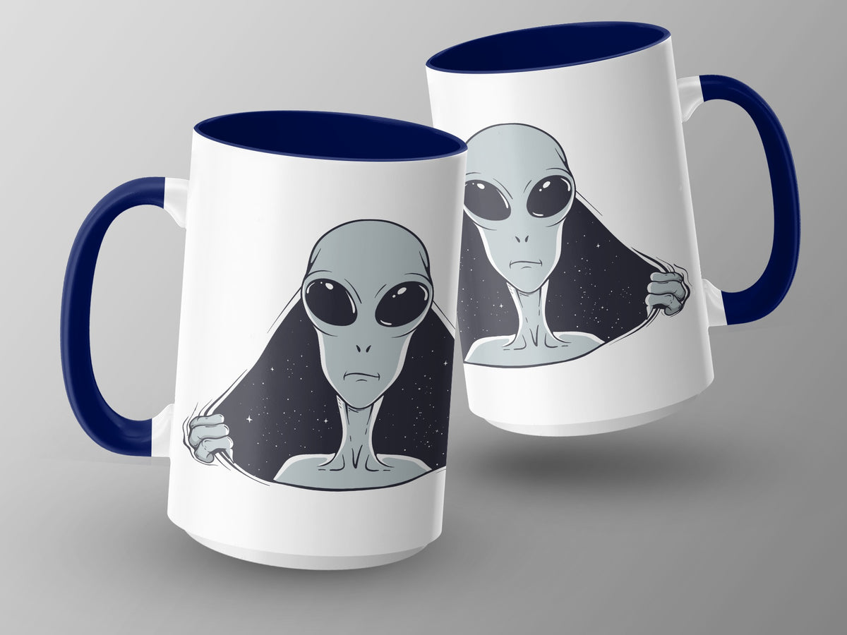 Two white mugs with blue handles featuring a grey alien peeking through starry space.