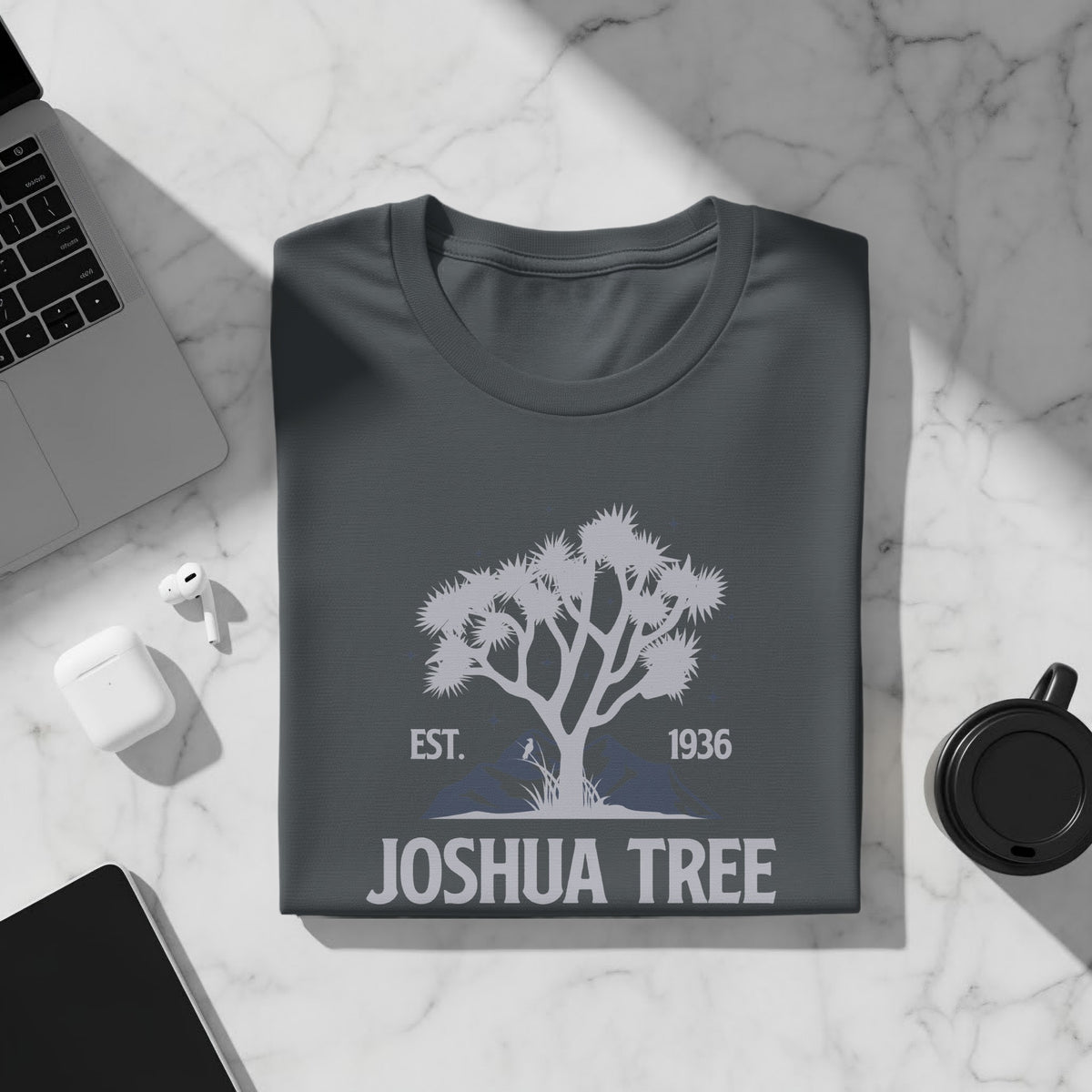 Dark grey t-shirt with Joshua Tree graphic, "EST. 1936 JOSHUA TREE" text.