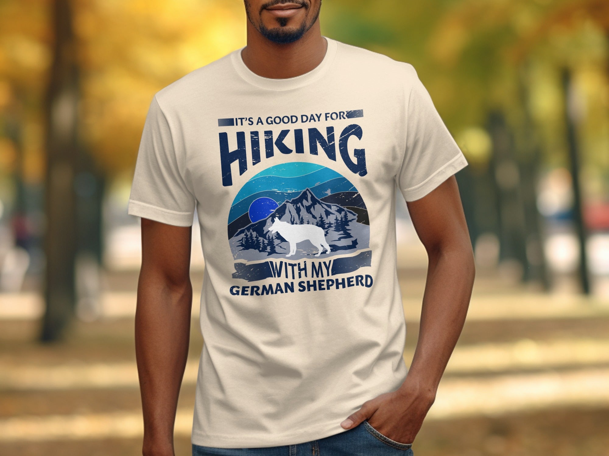 Cream t-shirt with "It's A Good Day For Hiking With My German Shepherd" text and graphic.