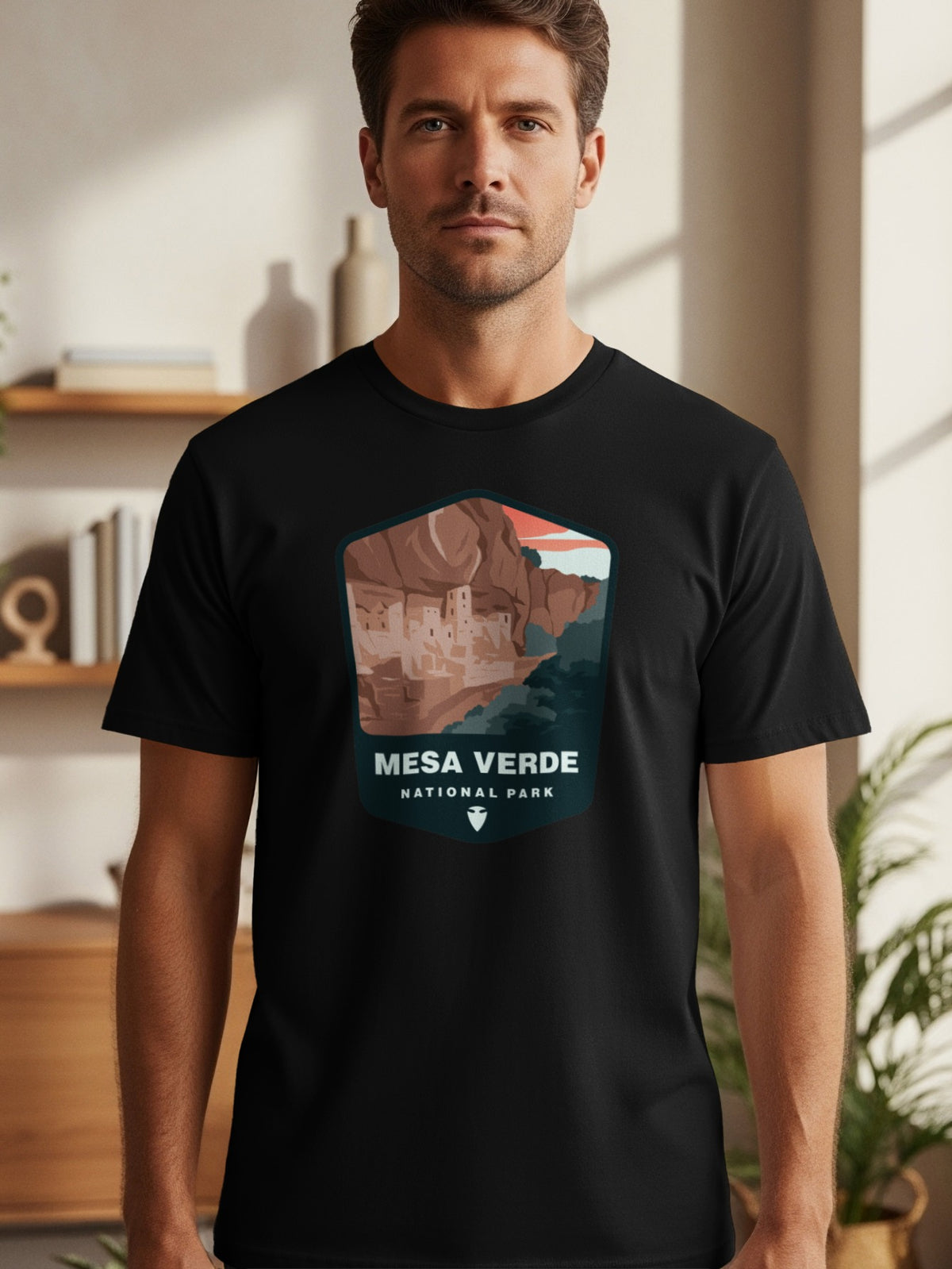 Black t-shirt featuring a hexagon graphic with Mesa Verde National Park cliff dwellings.