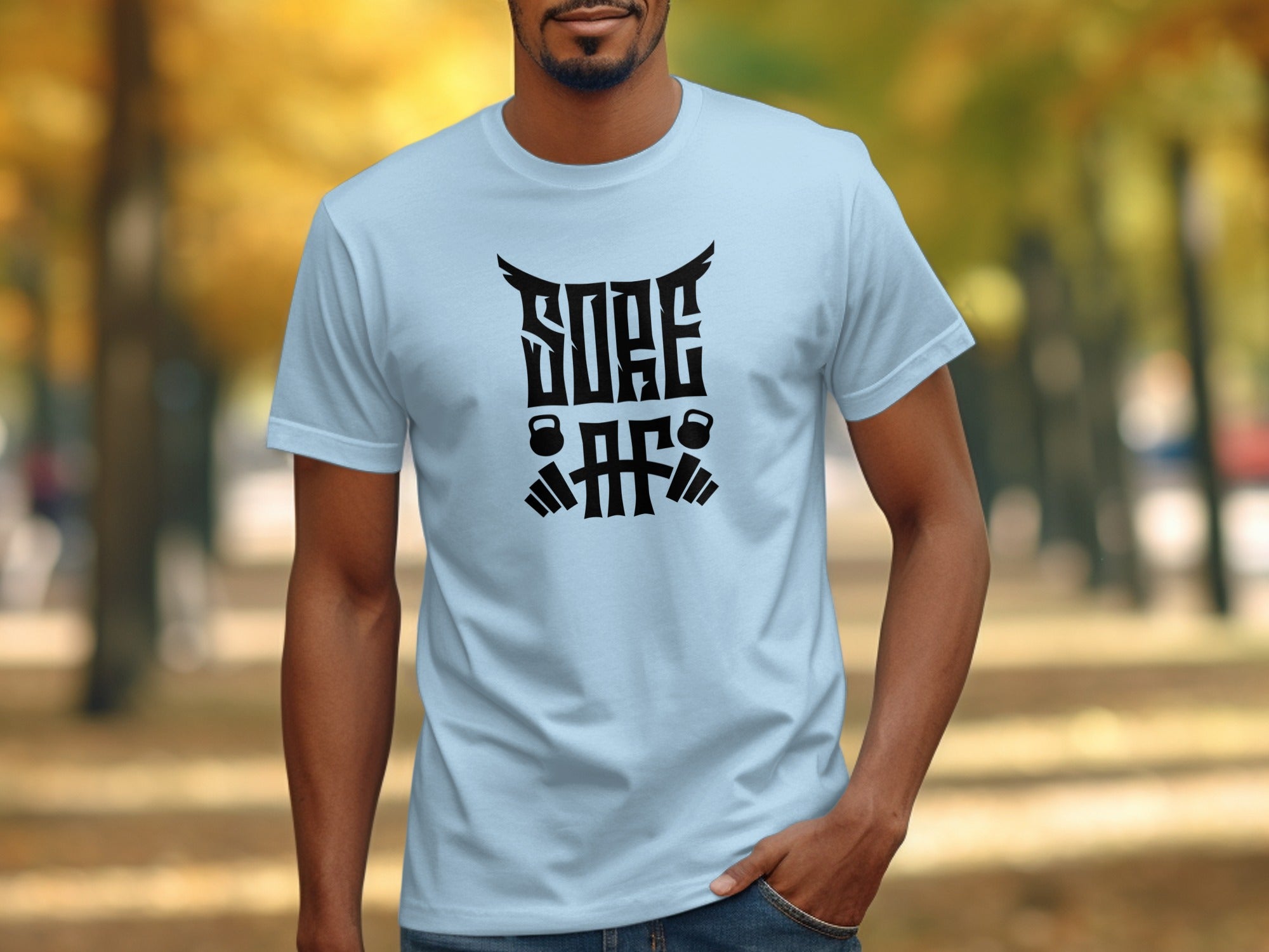 Light blue t-shirt with black "SORE AF" text and barbell graphics.