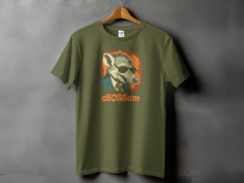 Green t-shirt with an illustration of a possum wearing sunglasses and a statement collar.
