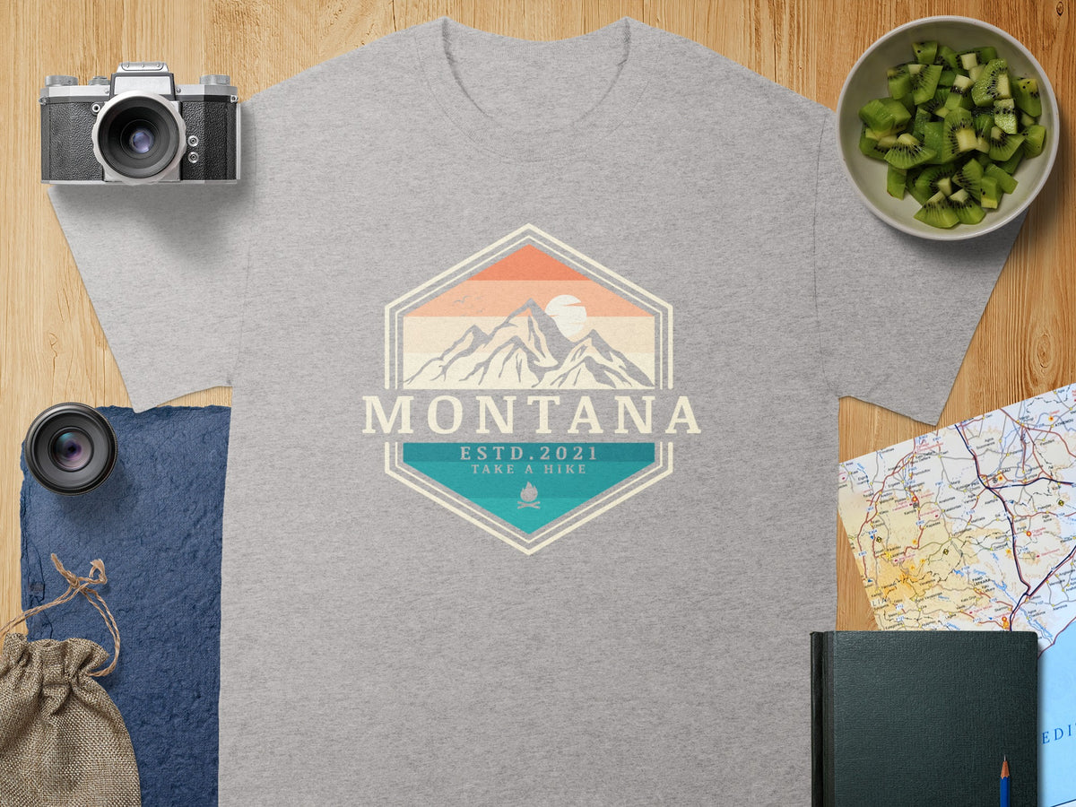 Gray t-shirt with Montana mountain logo, ESTD 2021, Take a Hike text.