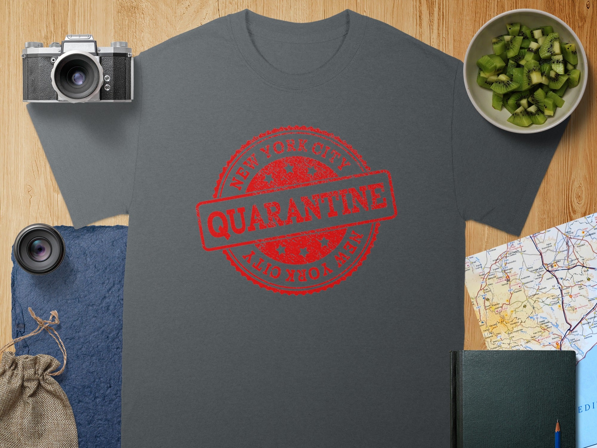 Grey t-shirt with distressed red "New York City Quarantine" stamp graphic.