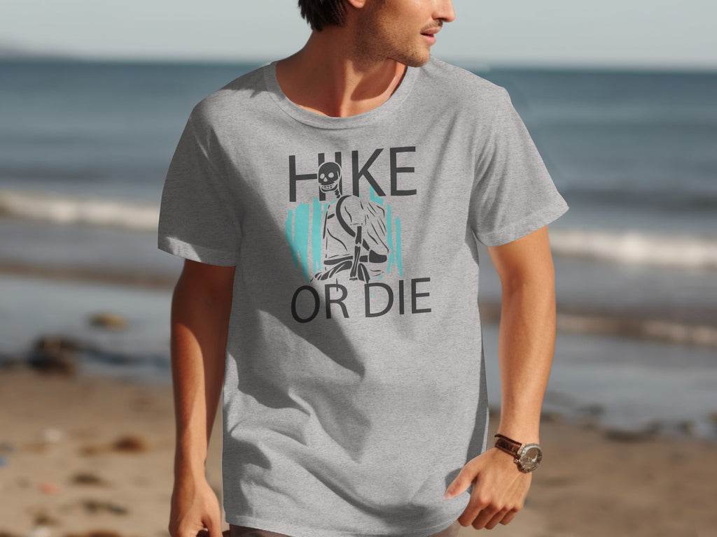 Grey t-shirt with "HIKE OR DIE" text and a skeleton hiker graphic.