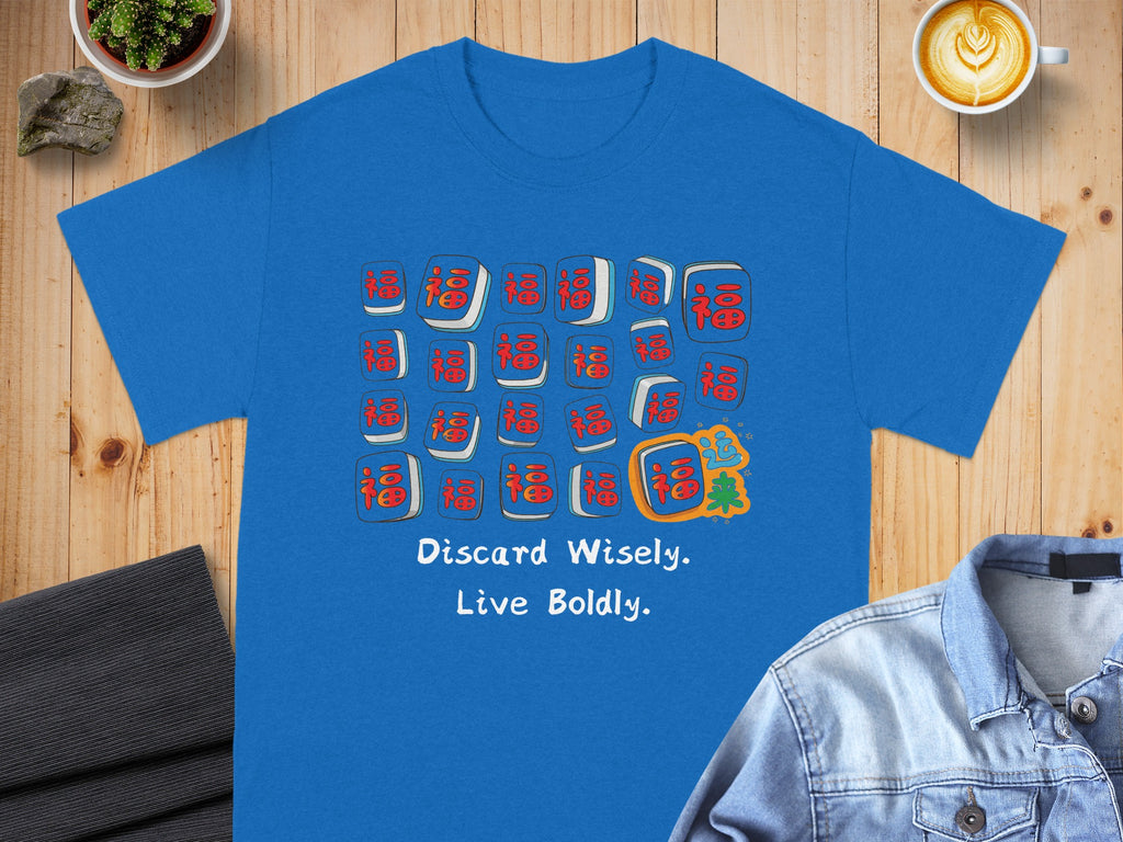 Blue t-shirt with mahjong tiles and "Discard Wisely. Live Boldly." text.