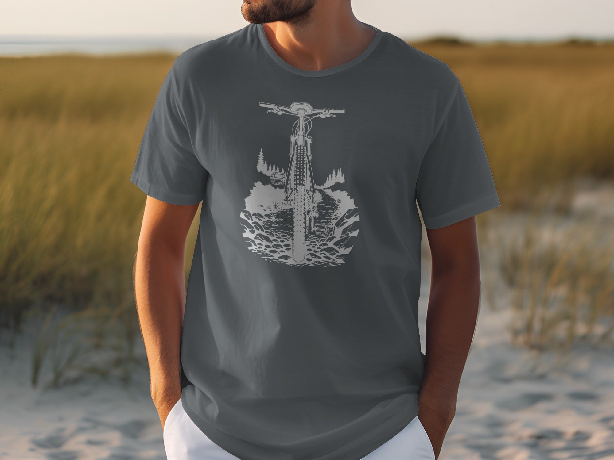 Gray t-shirt with a white graphic of a mountain bike on a trail.