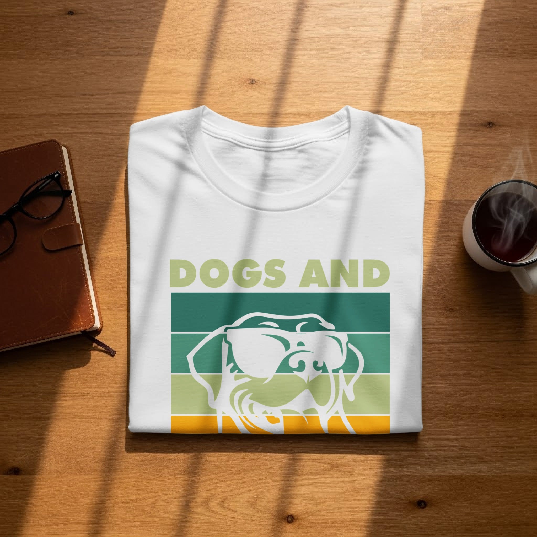 White t-shirt with "DOGS AND" text and a dog wearing sunglasses in a retro style.