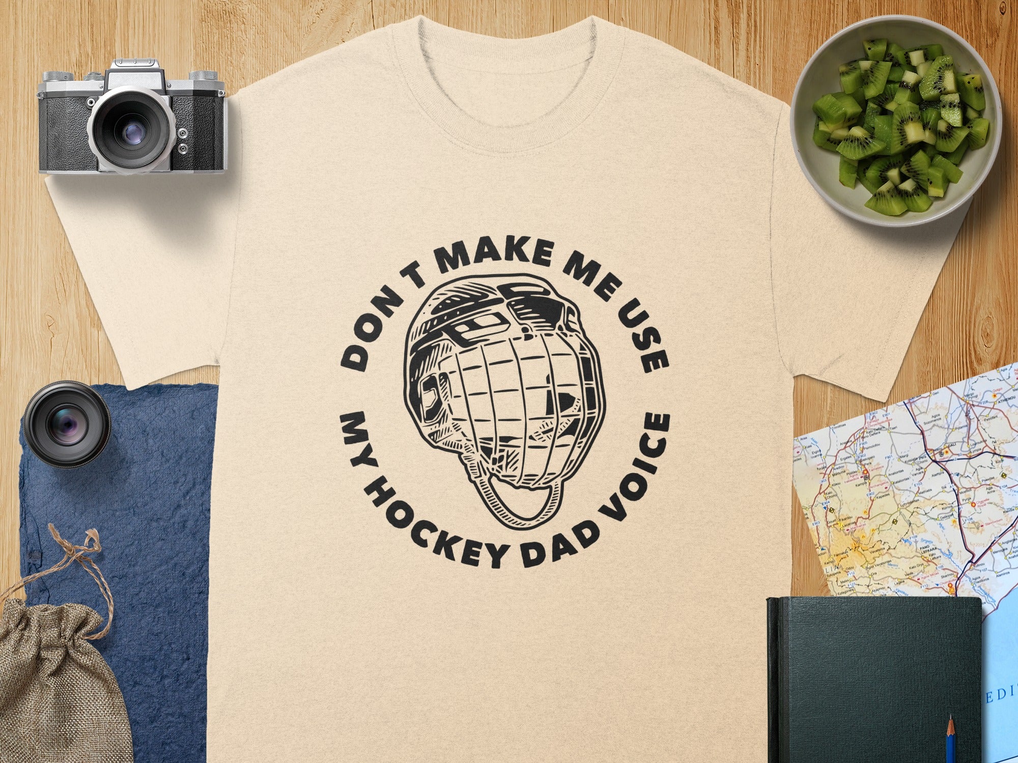 T-shirt with "Don't Make Me Use My Hockey Dad Voice" and hockey helmet graphic.