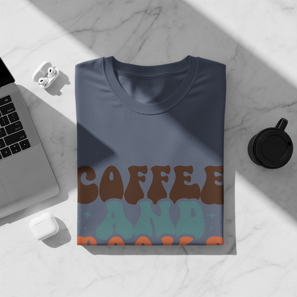 Navy t-shirt with "COFFEE AND" in retro wavy font.