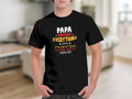 Black t-shirt with text "Papa Knows Everything if he doesn't know he makes stuff up really fast."