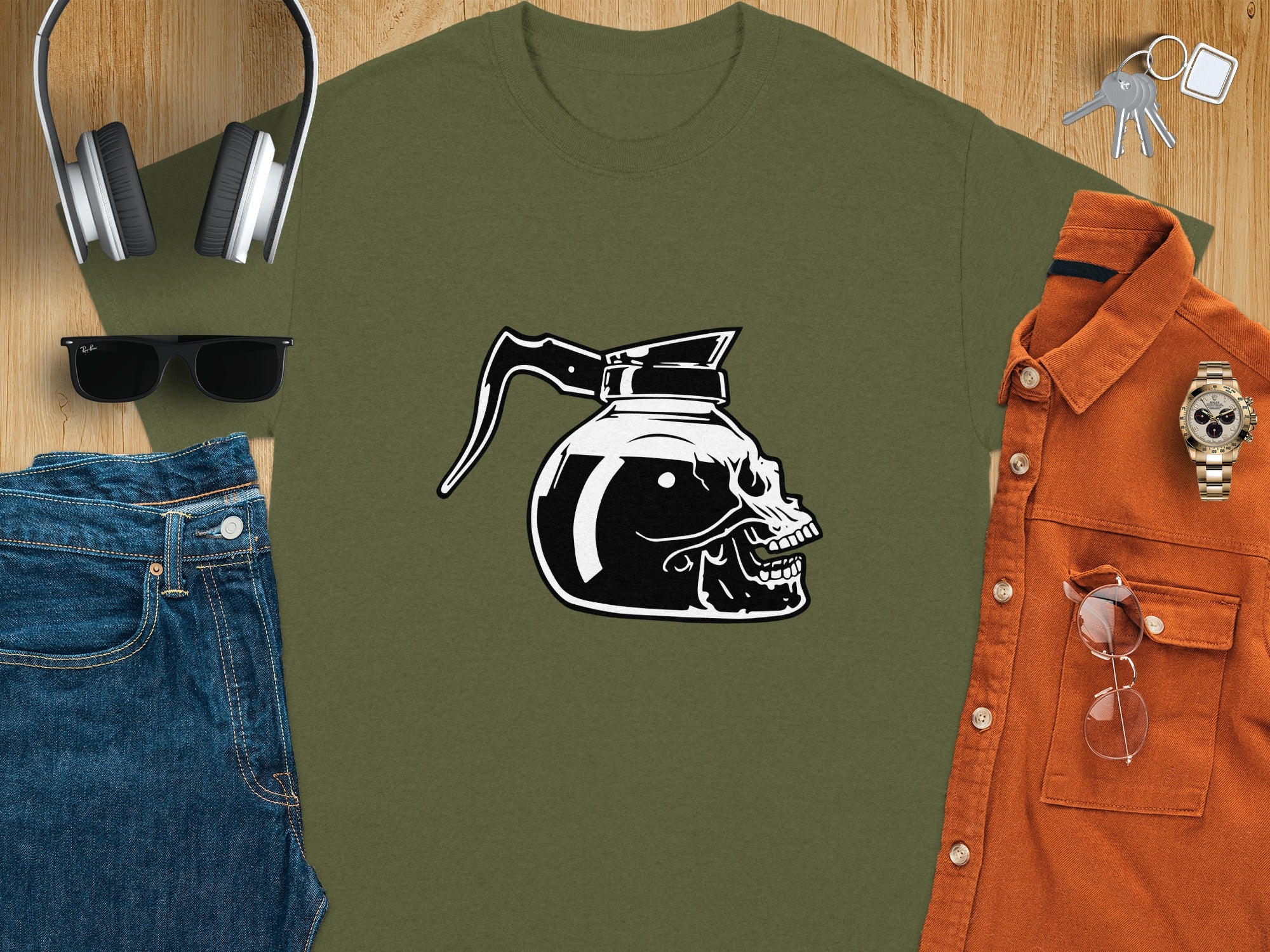 Olive green t-shirt with black and white skull coffee pot graphic.