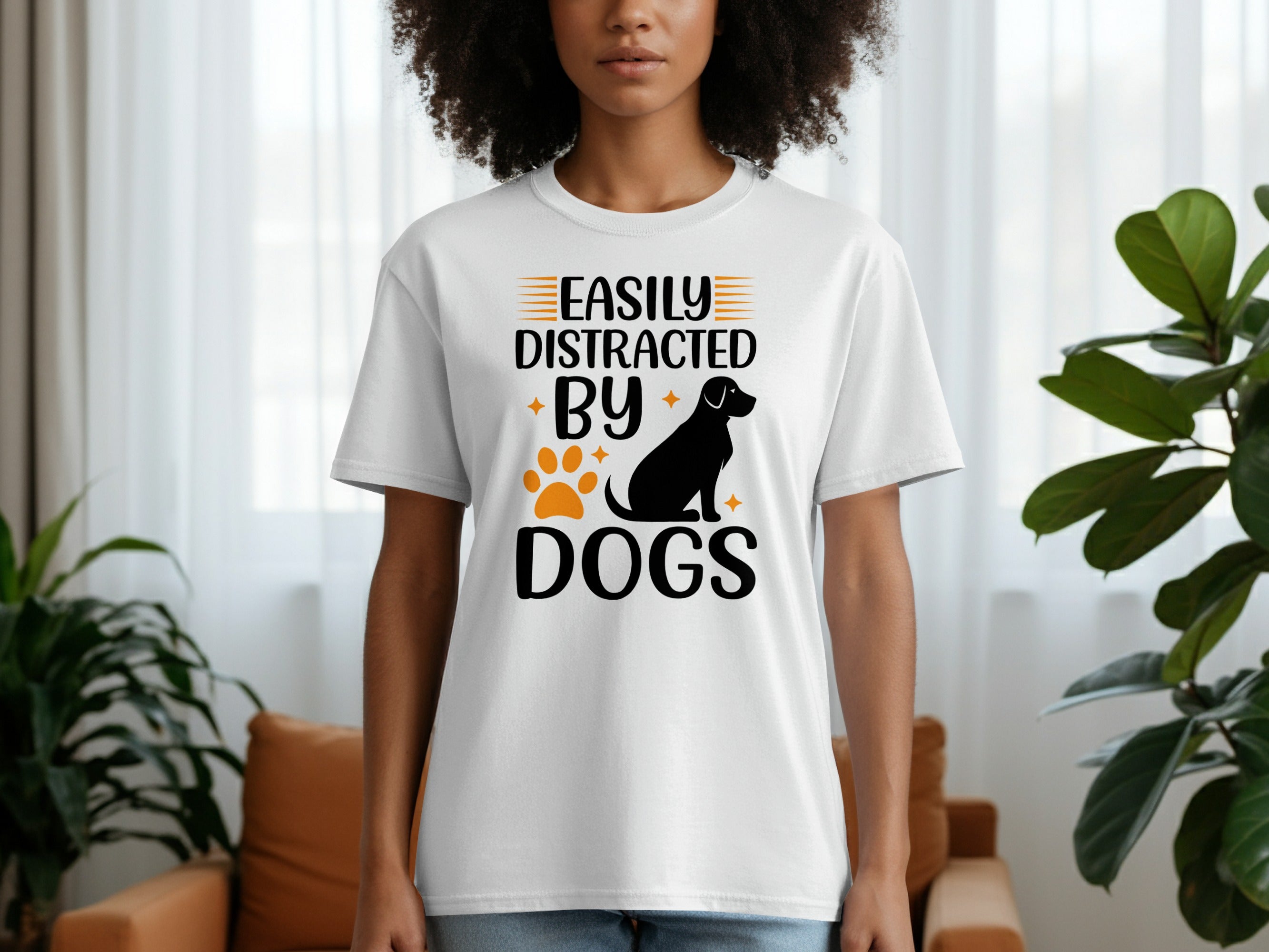 White t-shirt featuring "Easily Distracted By Dogs" in black text with a dog silhouette.
