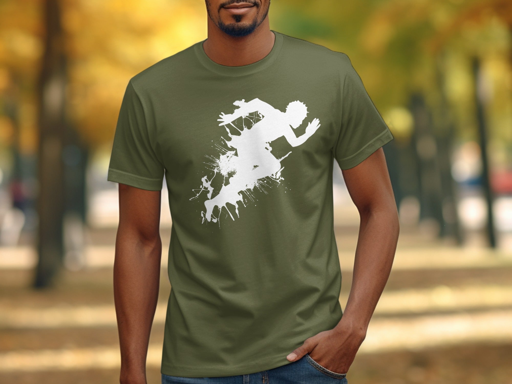 Olive green t-shirt with a running figure graphic made of white splatters.