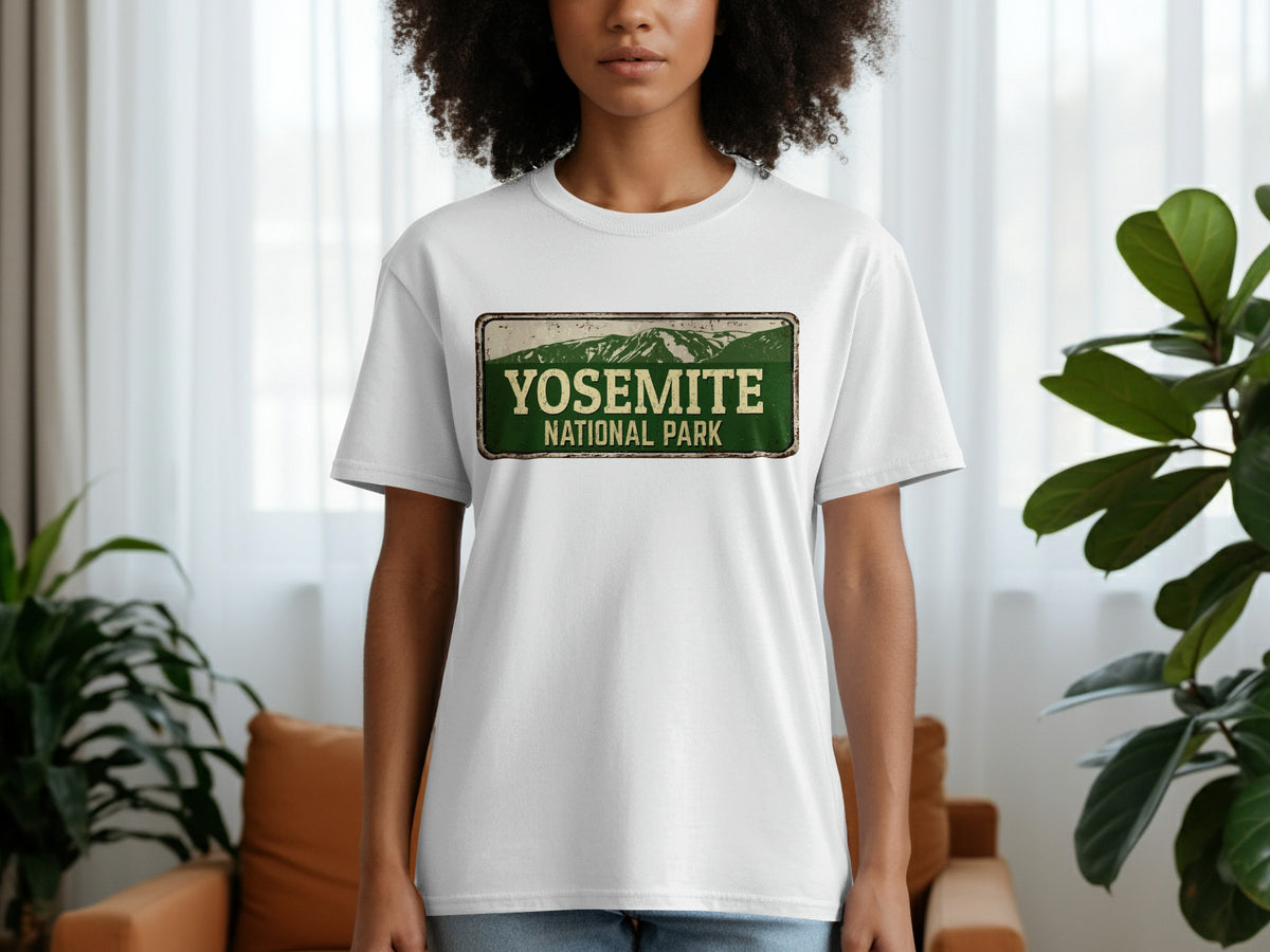 White t-shirt with Yosemite National Park vintage-style mountain graphic.