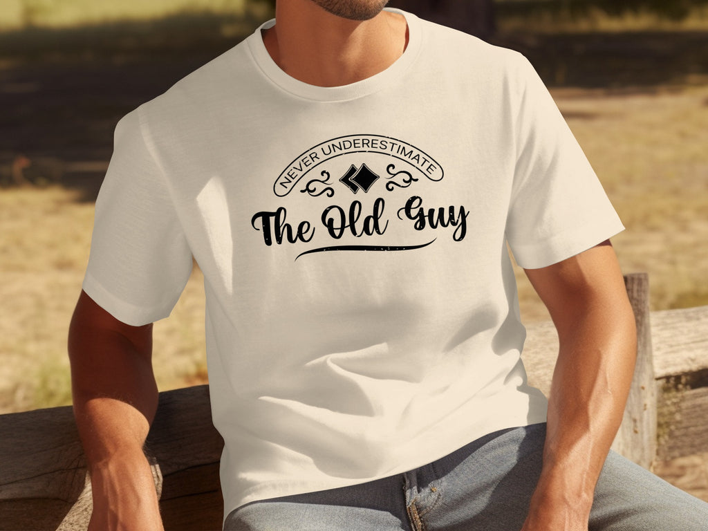 T-shirt with "NEVER UNDERESTIMATE The Old Guy" text and diamond graphic.