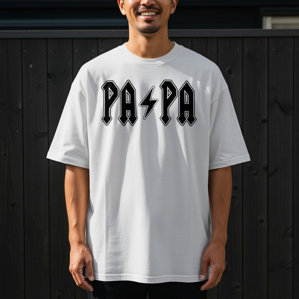 White t-shirt with "PAPA" in bold black letters and a lightning bolt graphic.