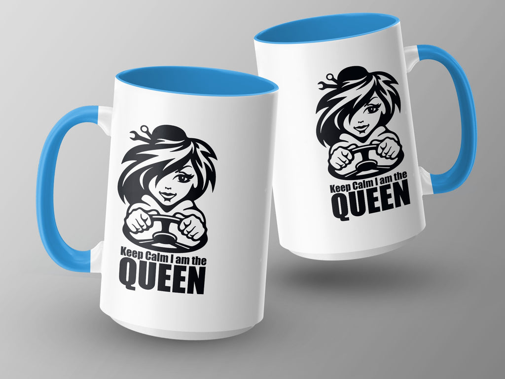 Two white mugs with blue handles feature a black graphic of a woman driving and the text "Keep Calm I am the QUEEN".