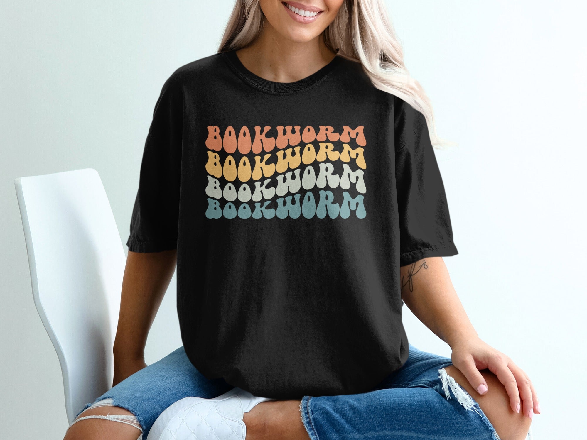 Black t-shirt with "BOOKWORM" in retro style stacked lettering.