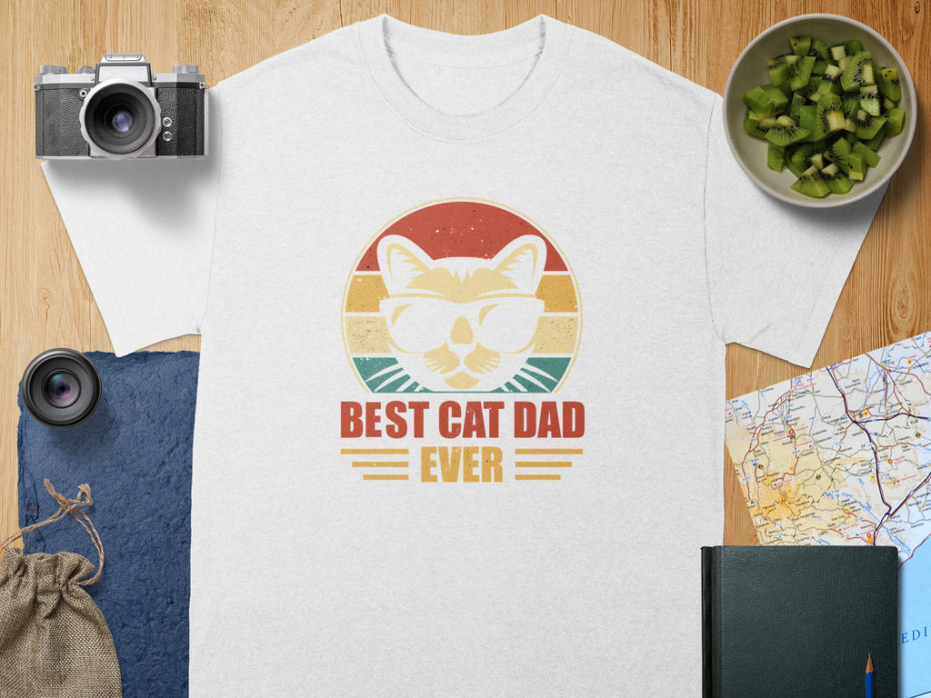 White t-shirt with retro cat graphic and "BEST CAT DAD EVER" text.