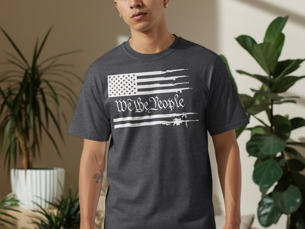Dark grey t-shirt with white American flag and "We the People" text graphic.