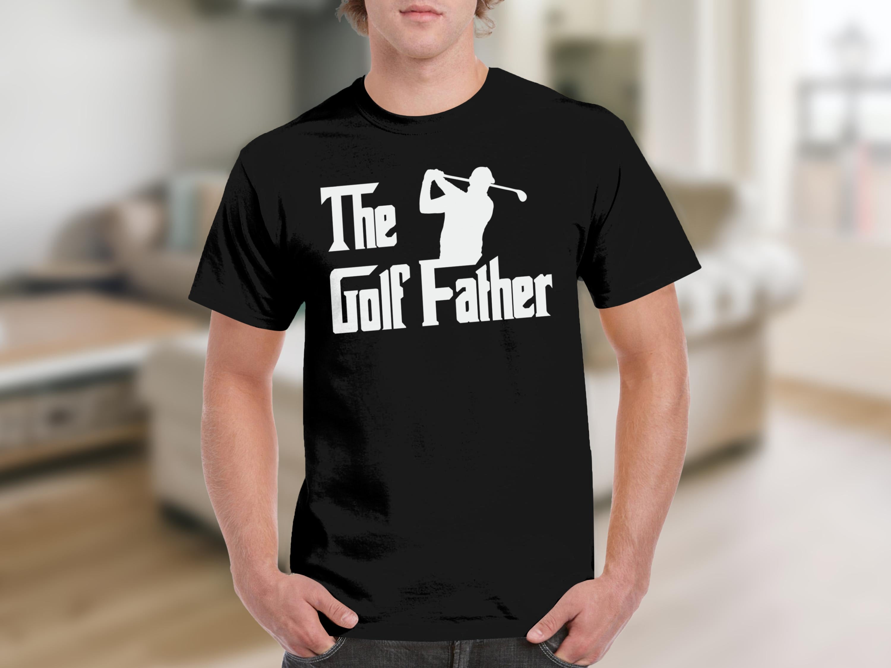 Black t-shirt with white text "The Golf Father" and golfer silhouette.