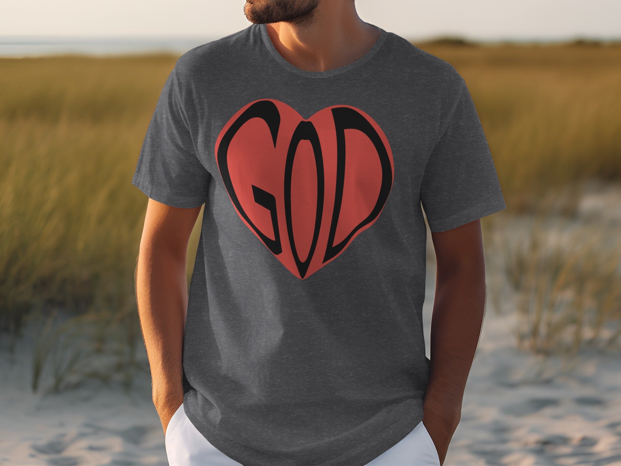 Dark grey t-shirt with red heart graphic containing black text "GOD"