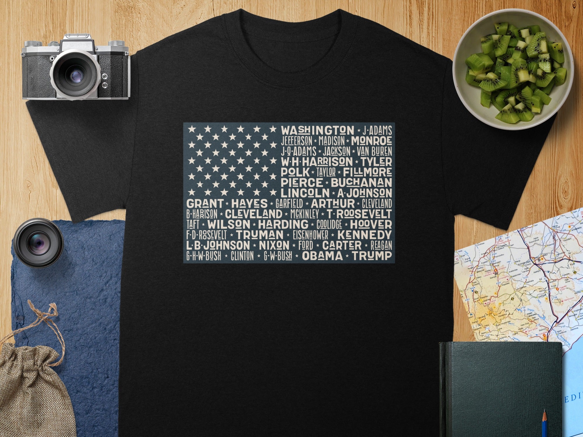 Black t-shirt with US Presidents' names listed inside an American flag design.