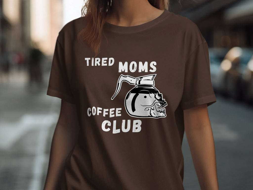 Tired Moms Coffee Club graphic on a brown t-shirt featuring a skull coffee pot.