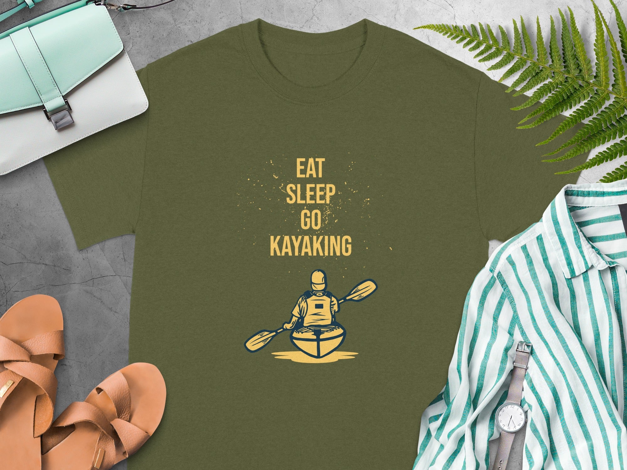 Olive t-shirt with "Eat Sleep Go Kayaking" text and kayak graphic.
