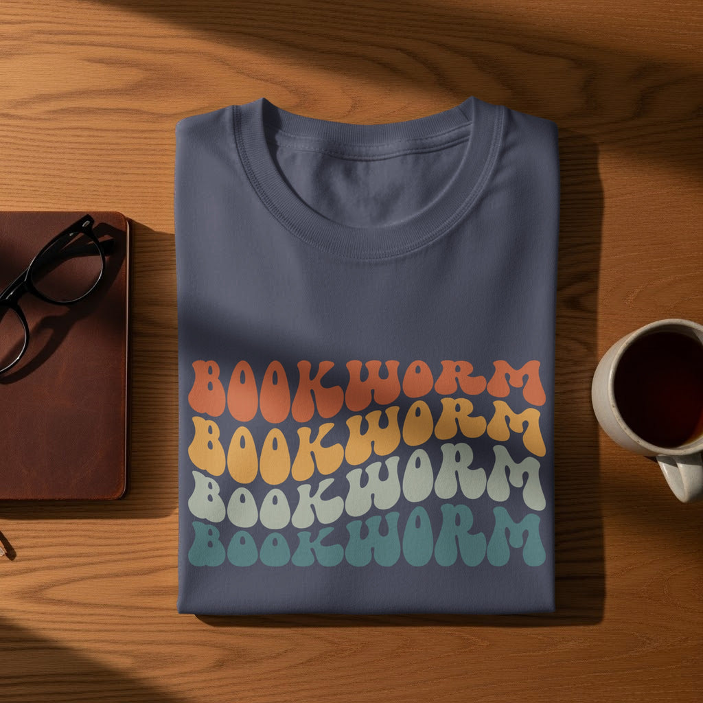 Navy t-shirt with "Bookworm" repeated in retro, colorful wavy font.