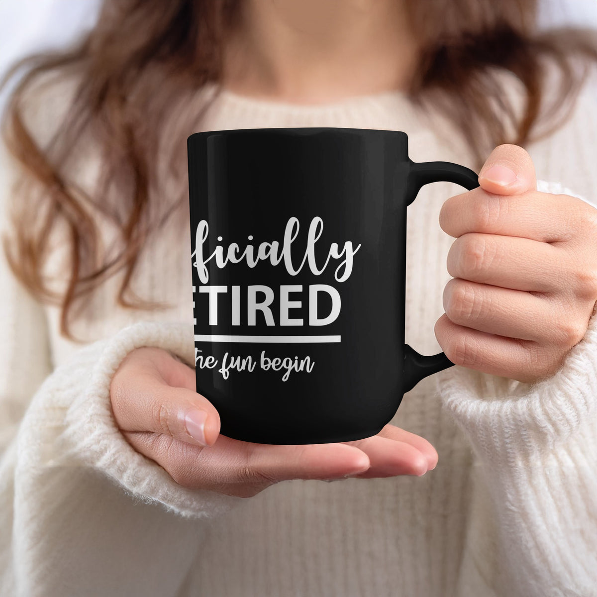 Black mug with white text that reads "Officially RETIRED the fun begin".