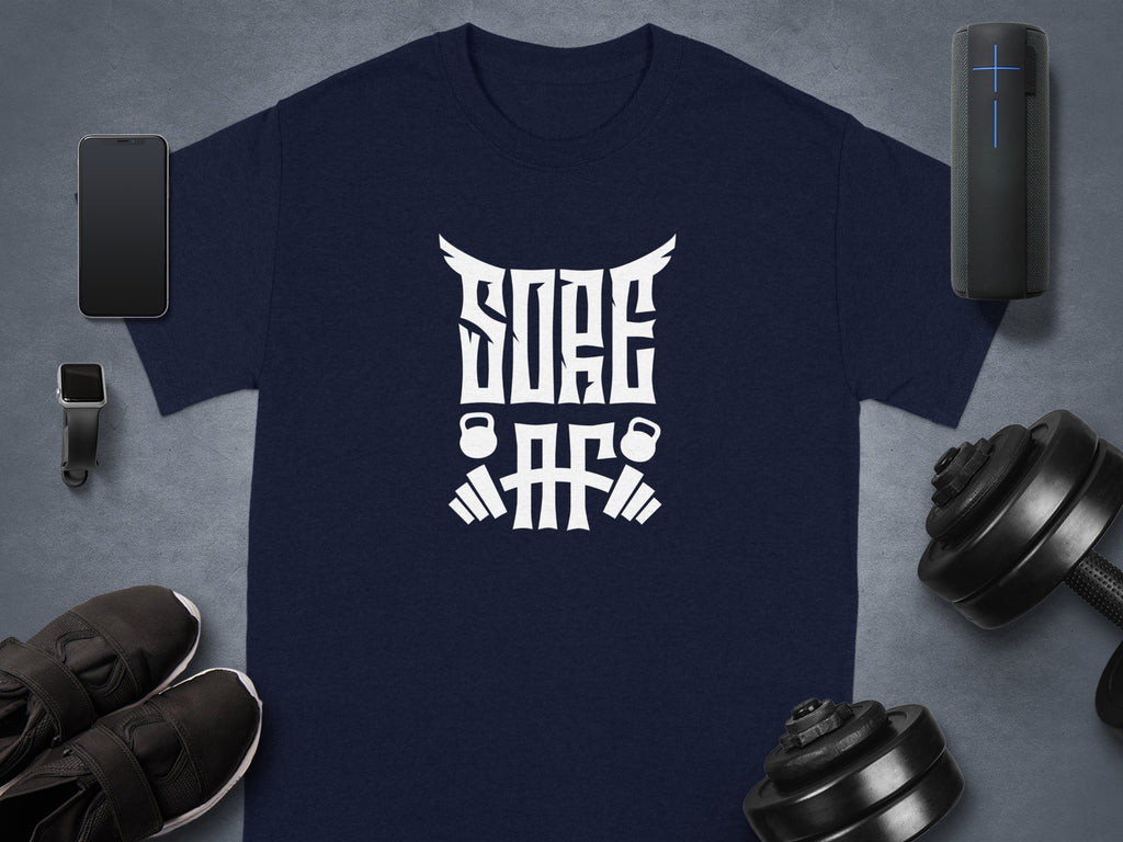 Navy t-shirt with "SORE AF" graphic and weightlifting imagery.