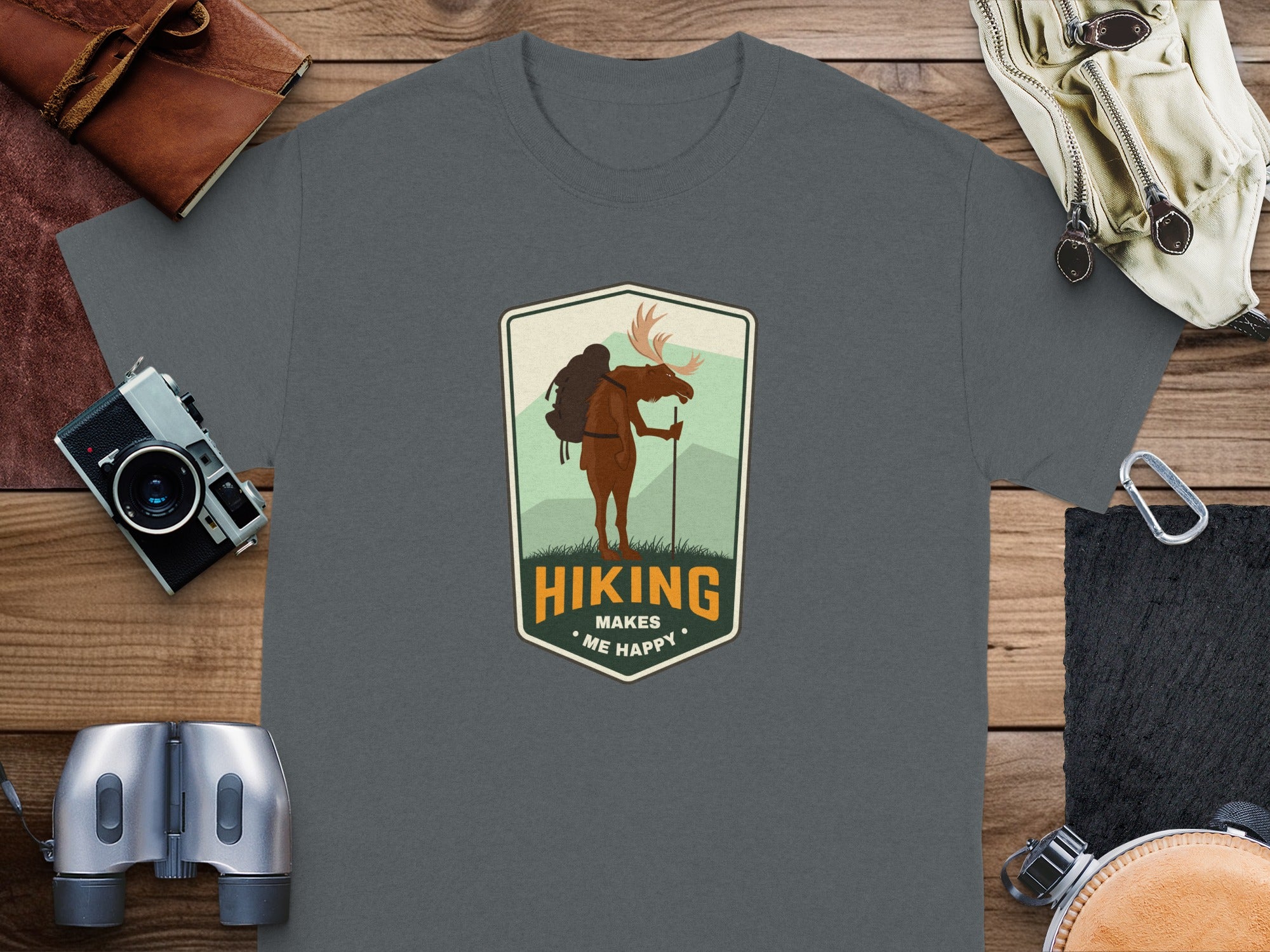 T-shirt with a moose hiking graphic that says "Hiking Makes Me Happy."