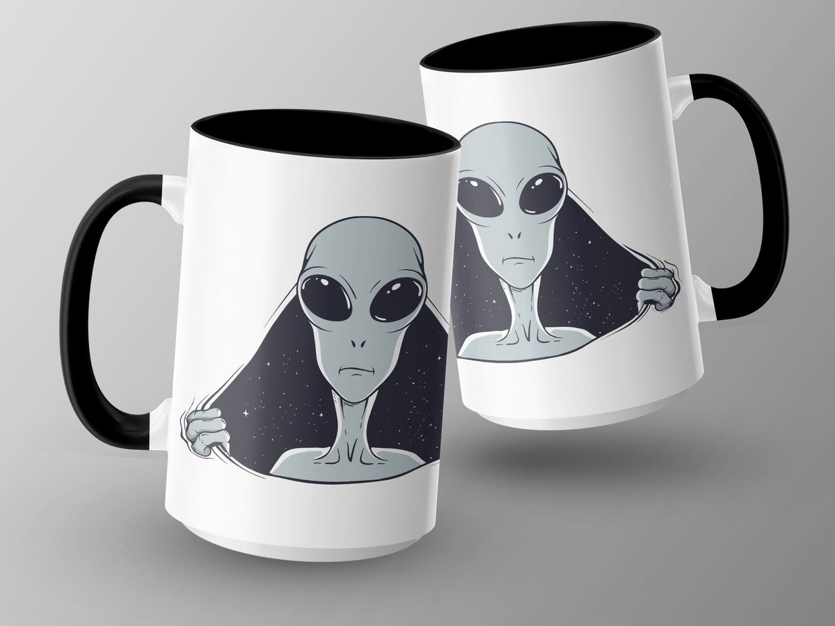 Two white mugs with black handles featuring gray aliens peeking out from space.