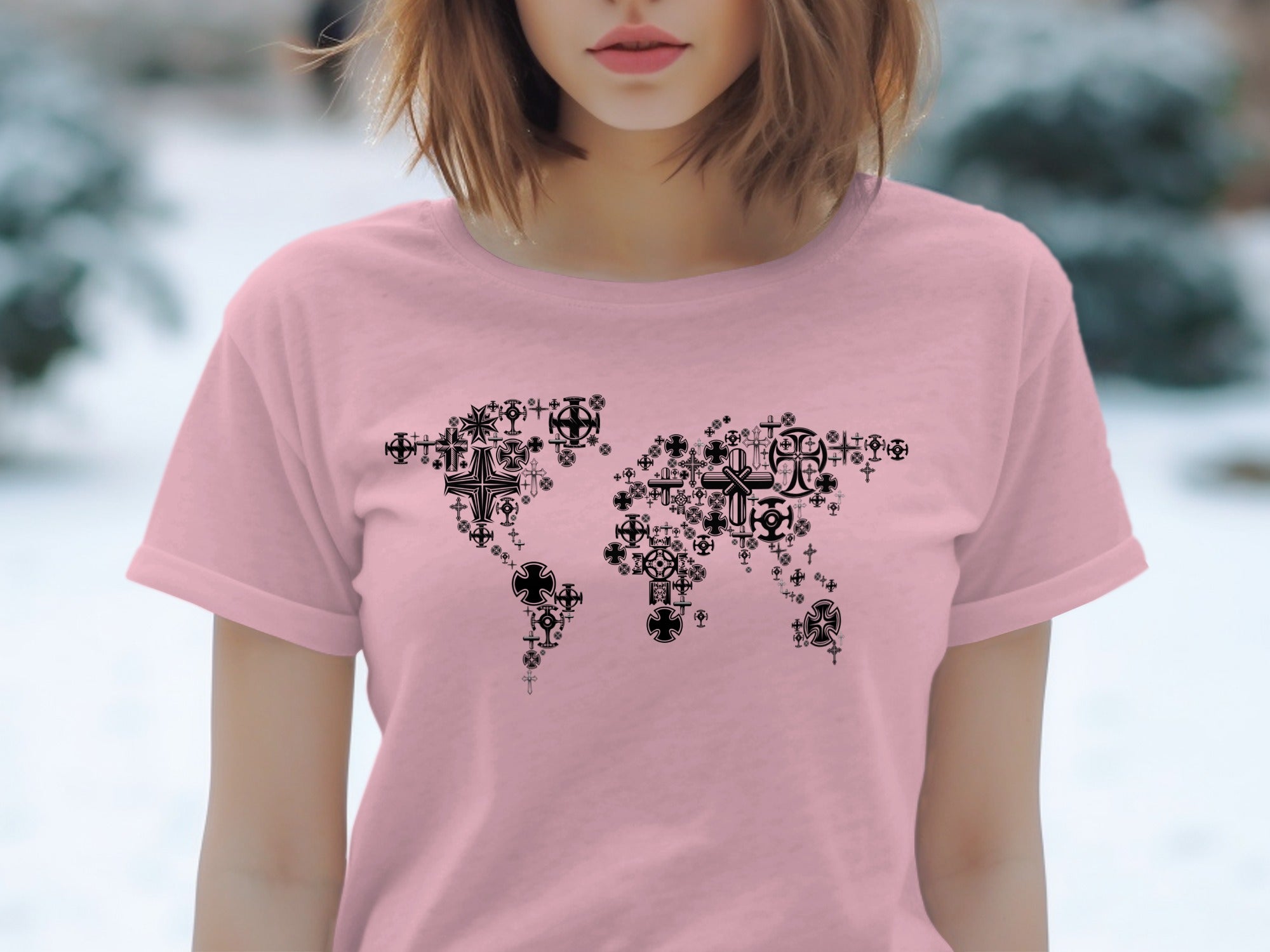 Pink t-shirt with a world map design made of various black crosses.