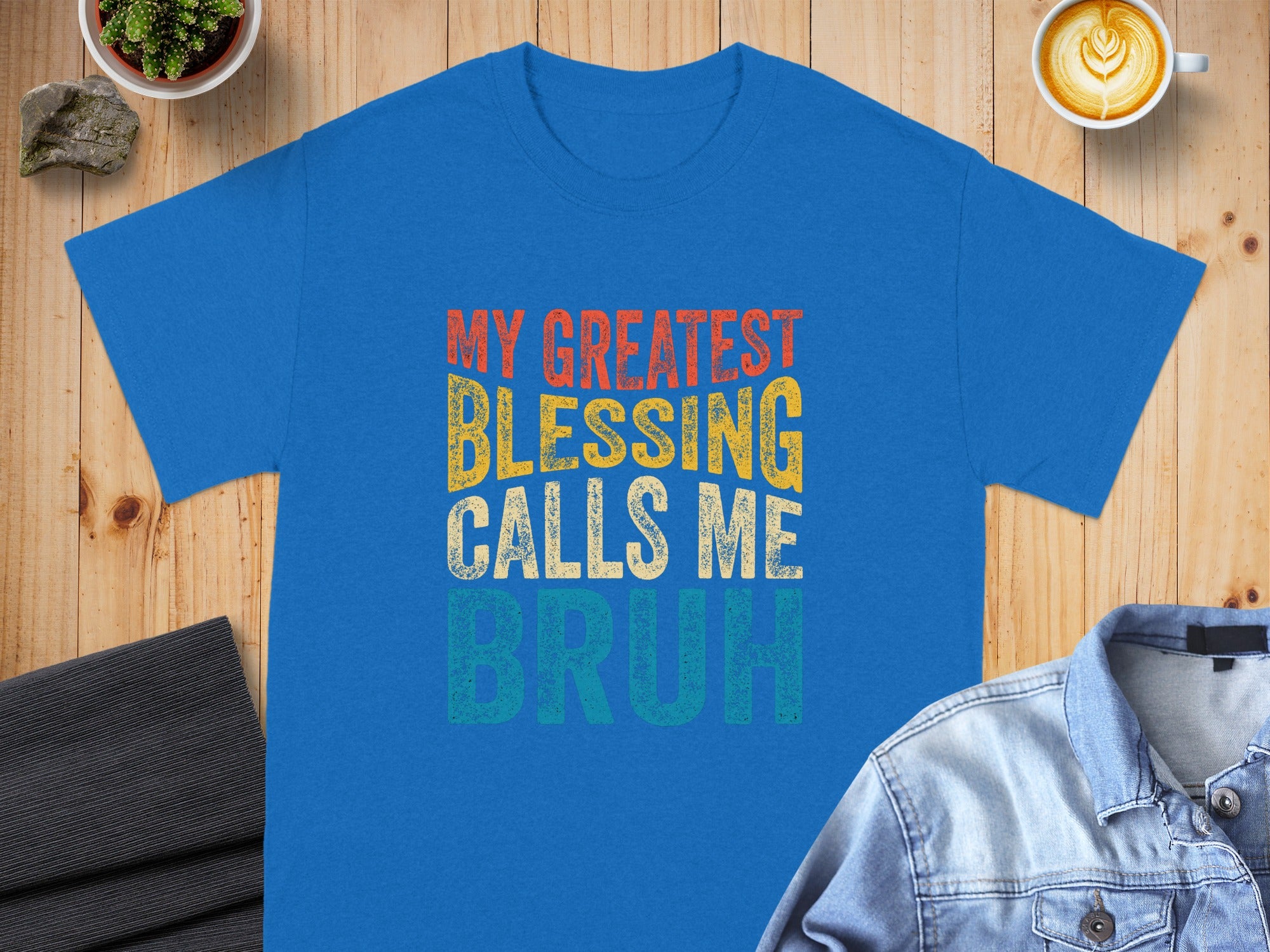 Blue t-shirt with distressed text: MY GREATEST BLESSING CALLS ME BRUH.