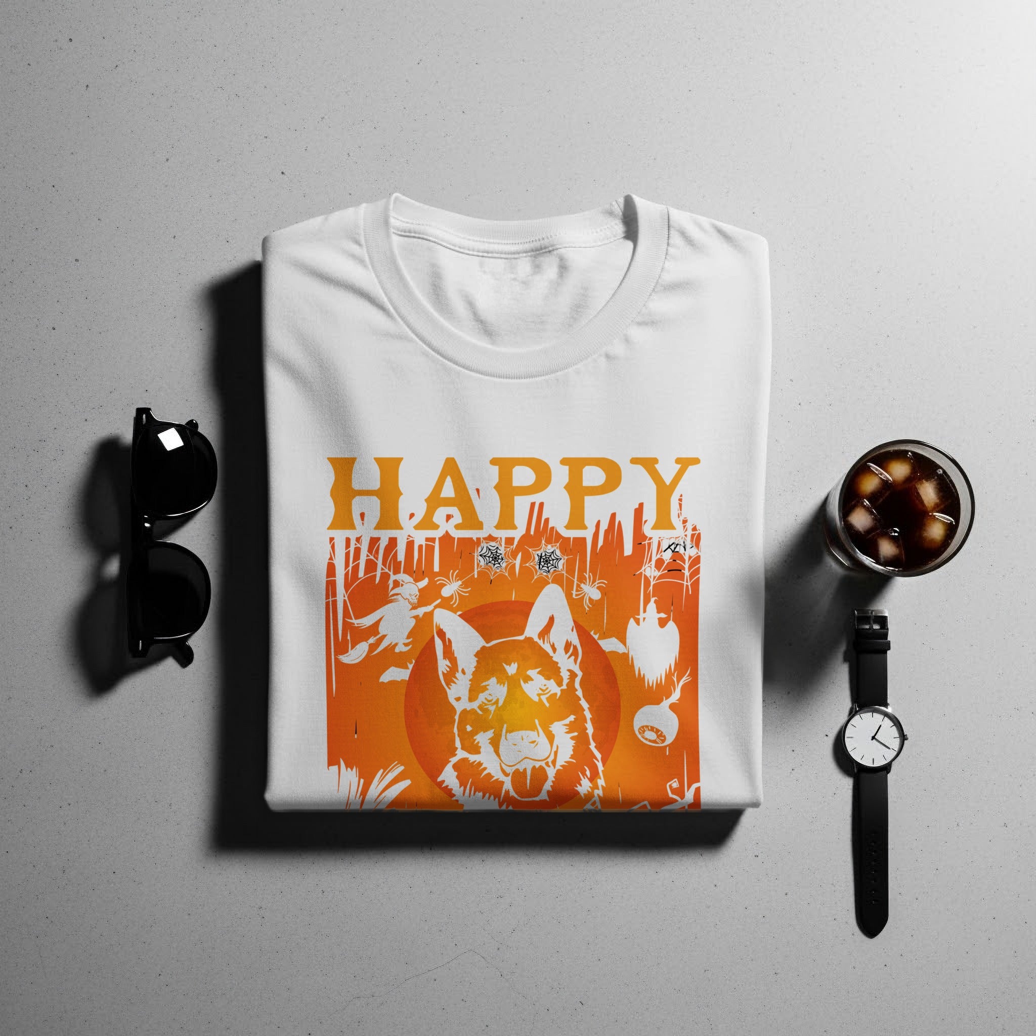 White t-shirt with orange Halloween graphic including dog, spiders, and text "HAPPY".