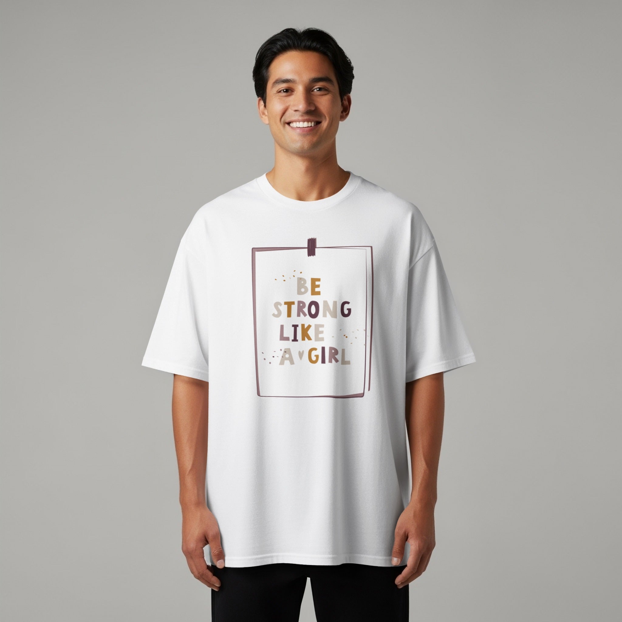White t-shirt with framed text "BE STRONG LIKE A GIRL"