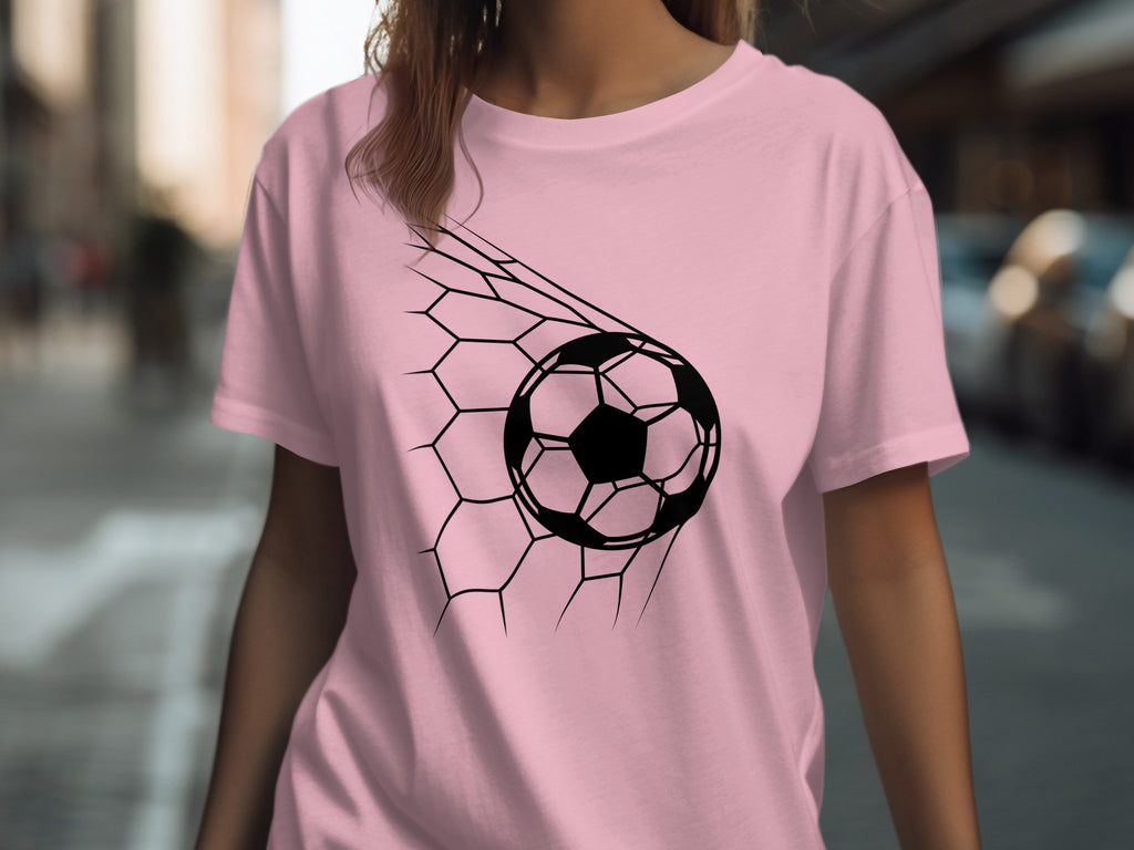 Pink t-shirt with black soccer ball and net graphic design.