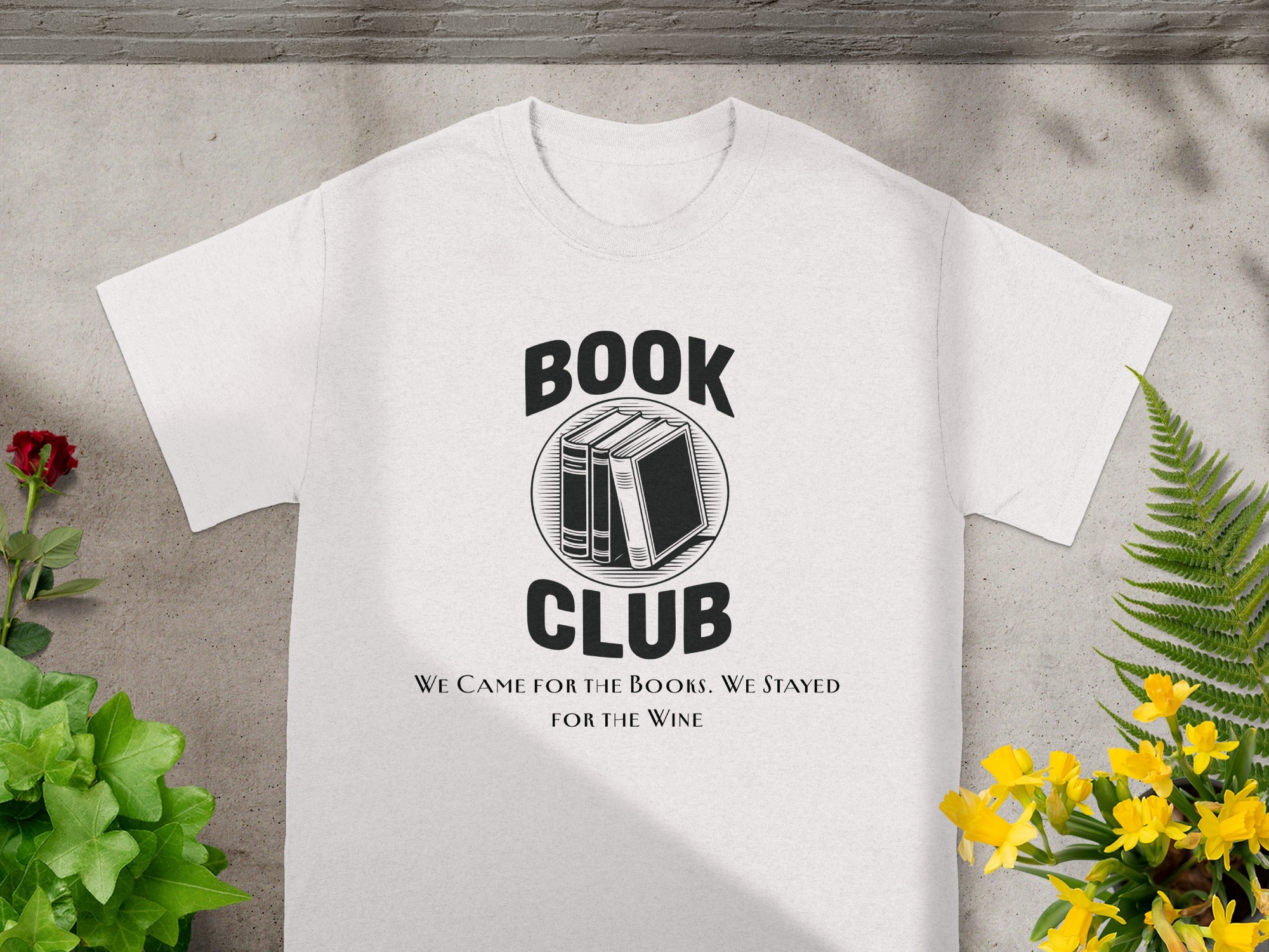 White t-shirt with "BOOK CLUB" text, three books, and a wine quote.