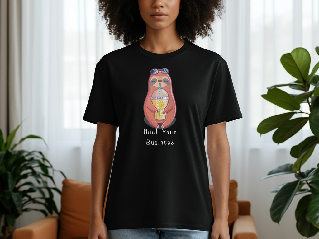Black t-shirt with a graphic of a sloth drinking juice and text that reads "Mind Your Business".
