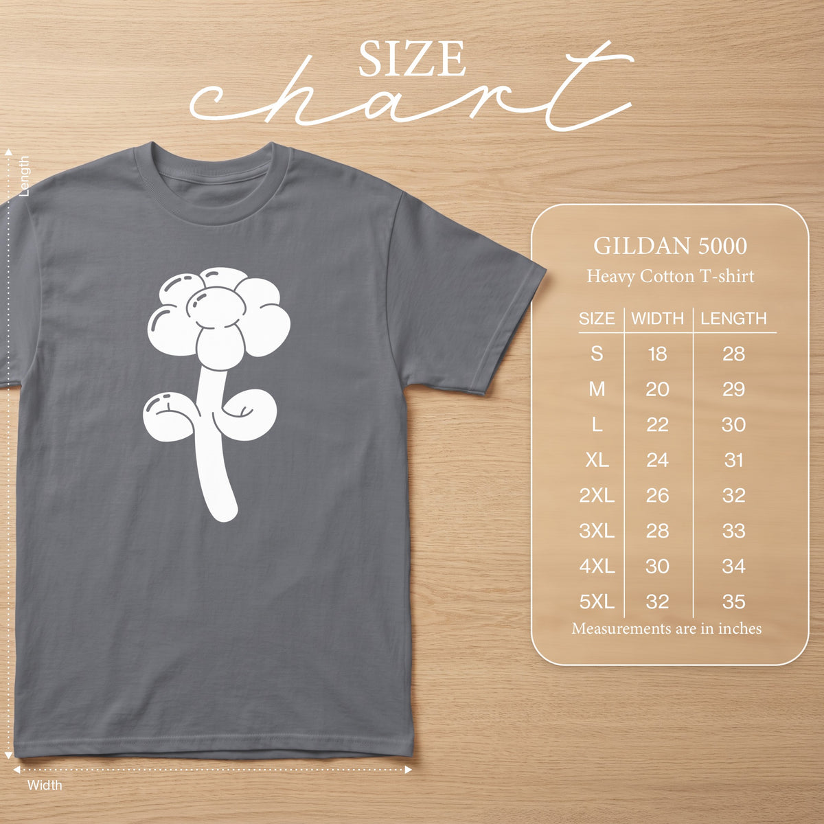 Gray Gildan 5000 heavy cotton t-shirt with white flower graphic and size chart.