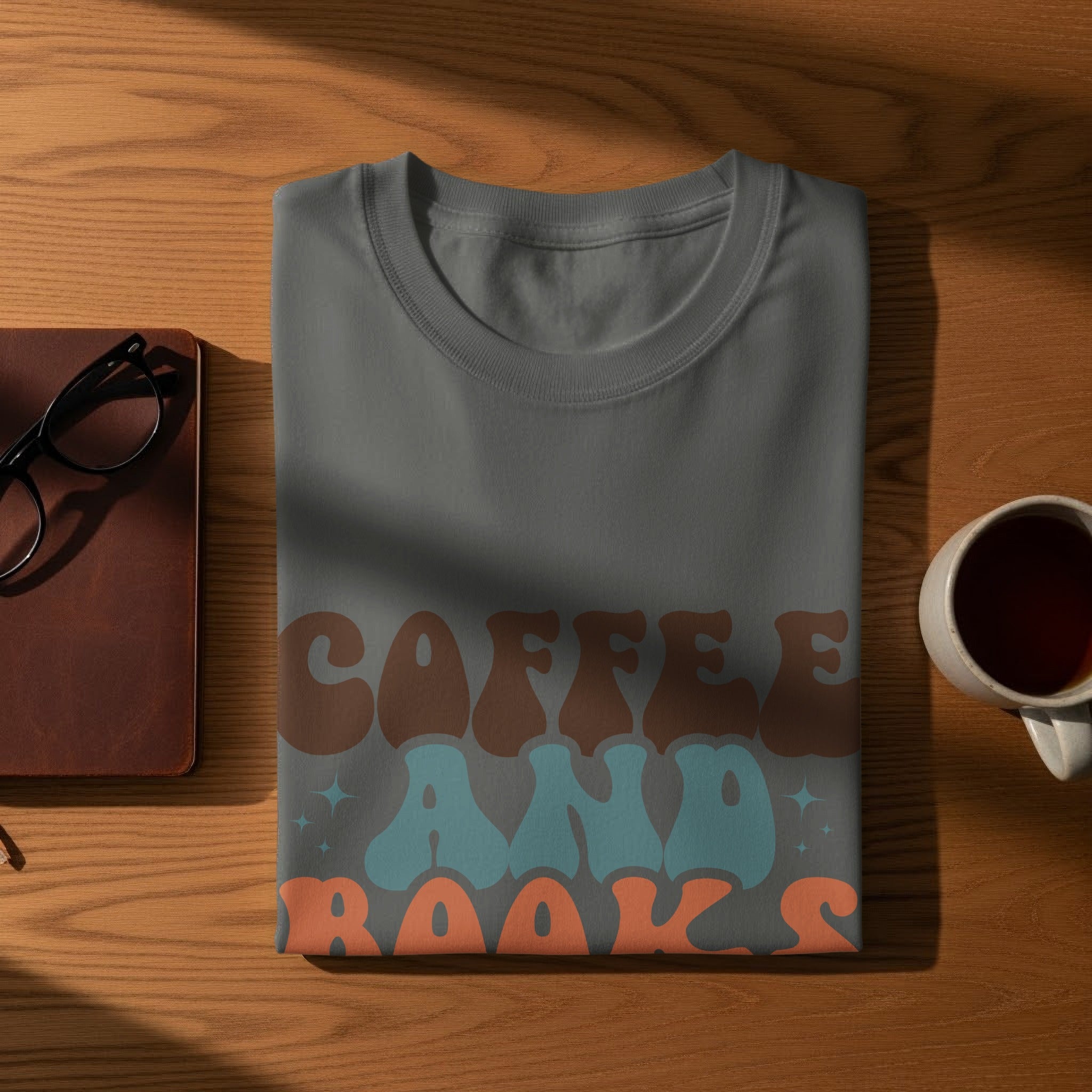 T-shirt with "Coffee And Books" text and graphic designs.